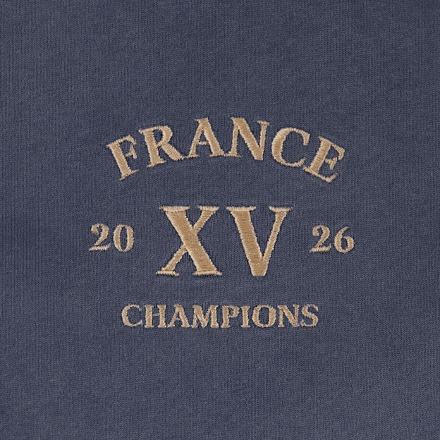 R1823 France Champions 2026 Quarter Zip Top Petrol Blue - Champions Embroidery Close-up